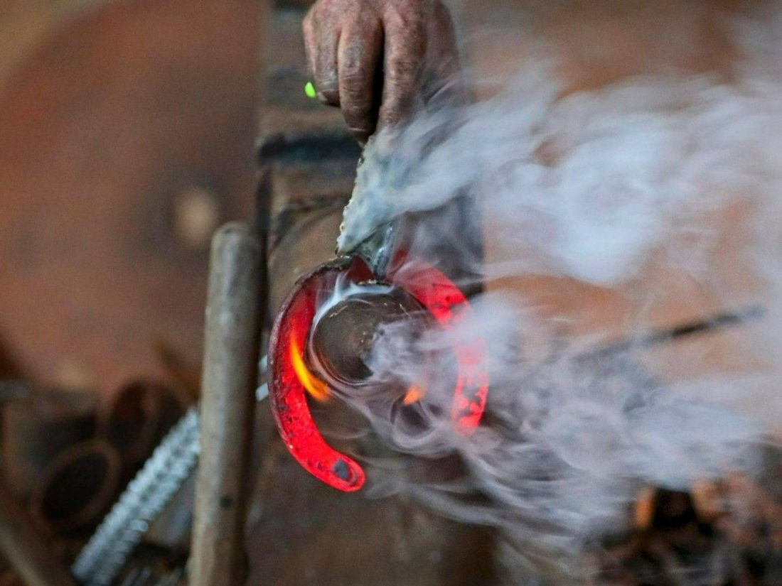 Blacksmith Brendan making a horseshoe